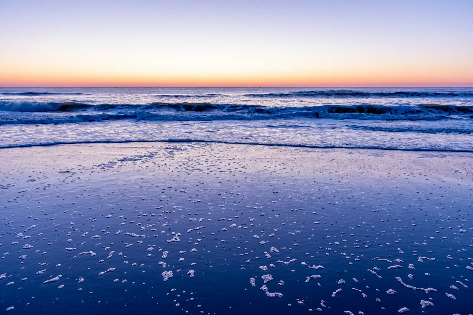Waves along Avalon beach at dusk, New Jersey
