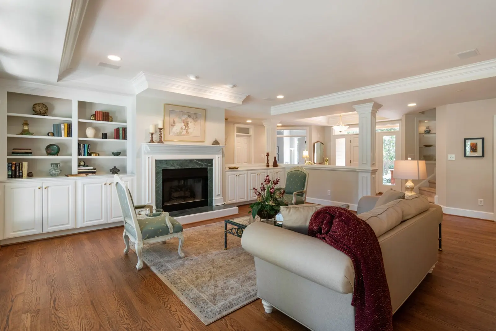 Illustrative living room with fireplace and built-in shelving