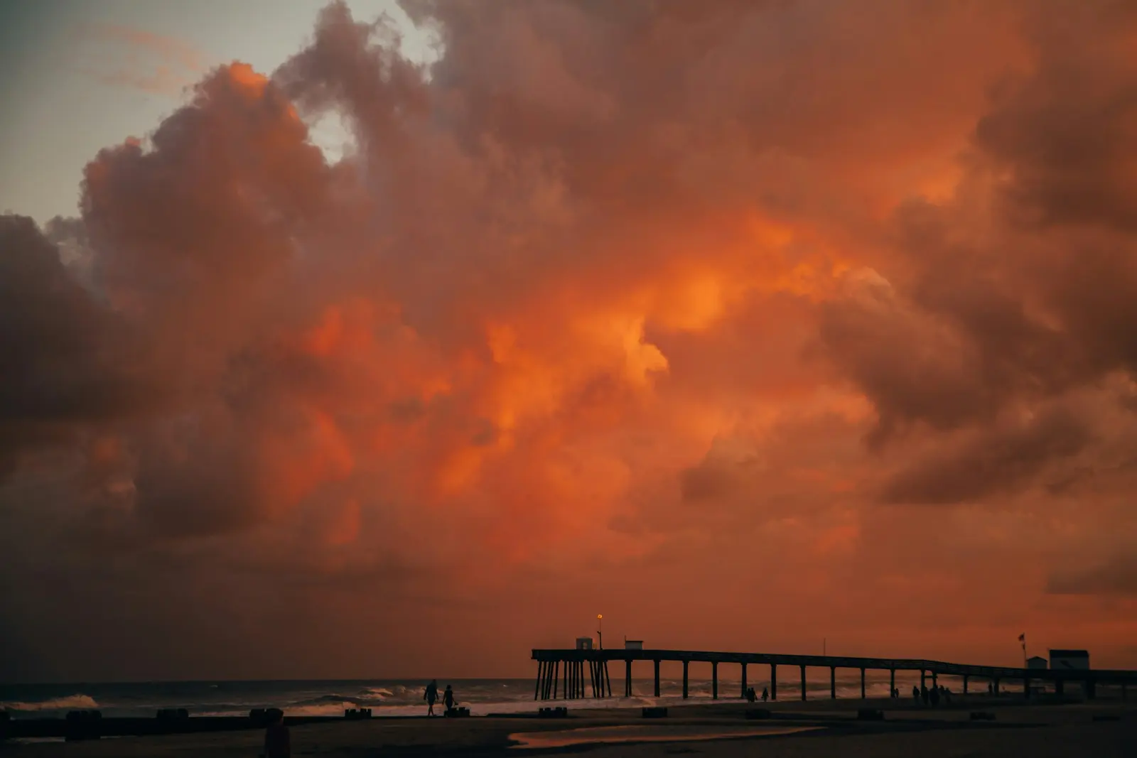 Sunset over the pier and shoreline in Ocean City, New Jersey